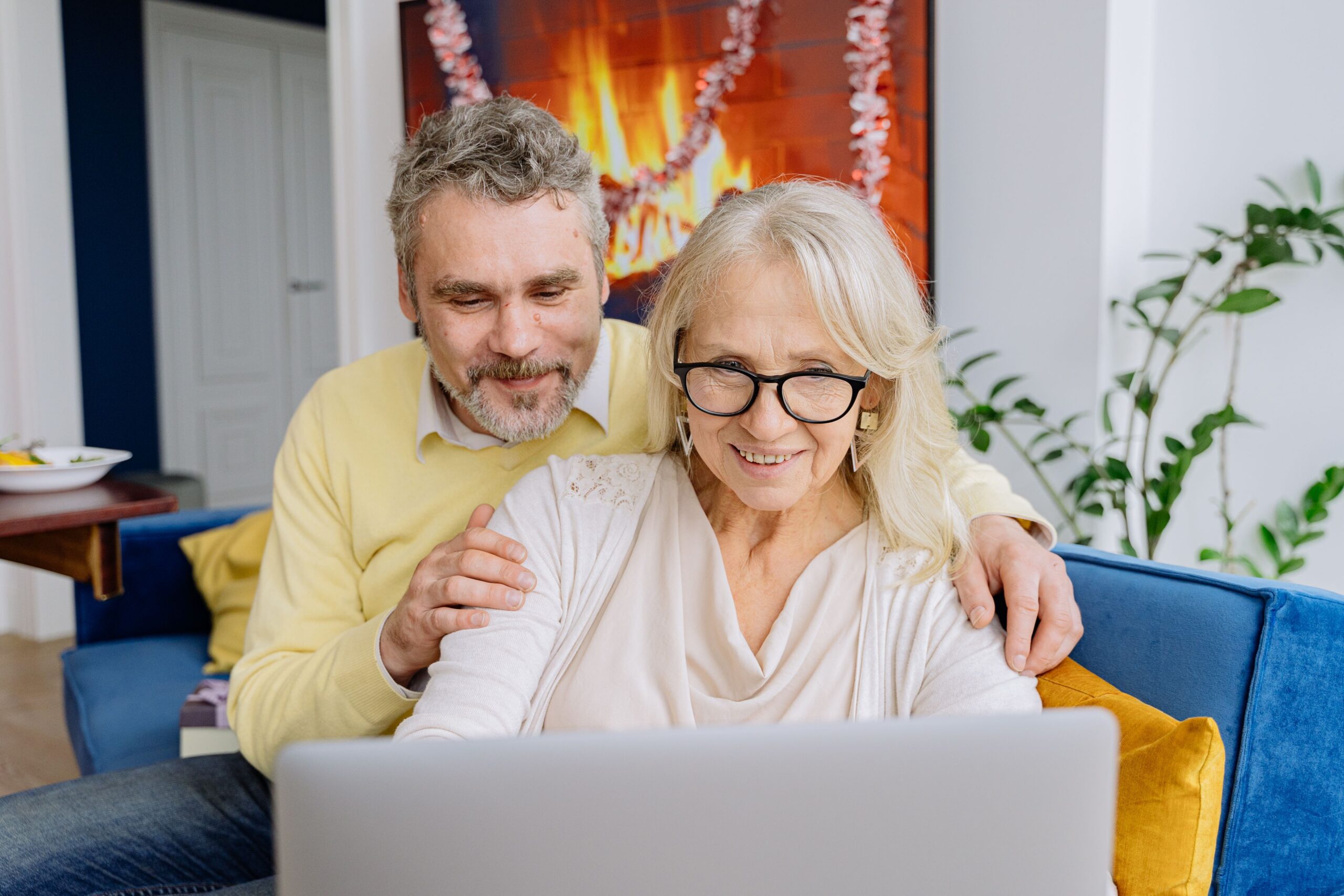 Senior couple shopping online together